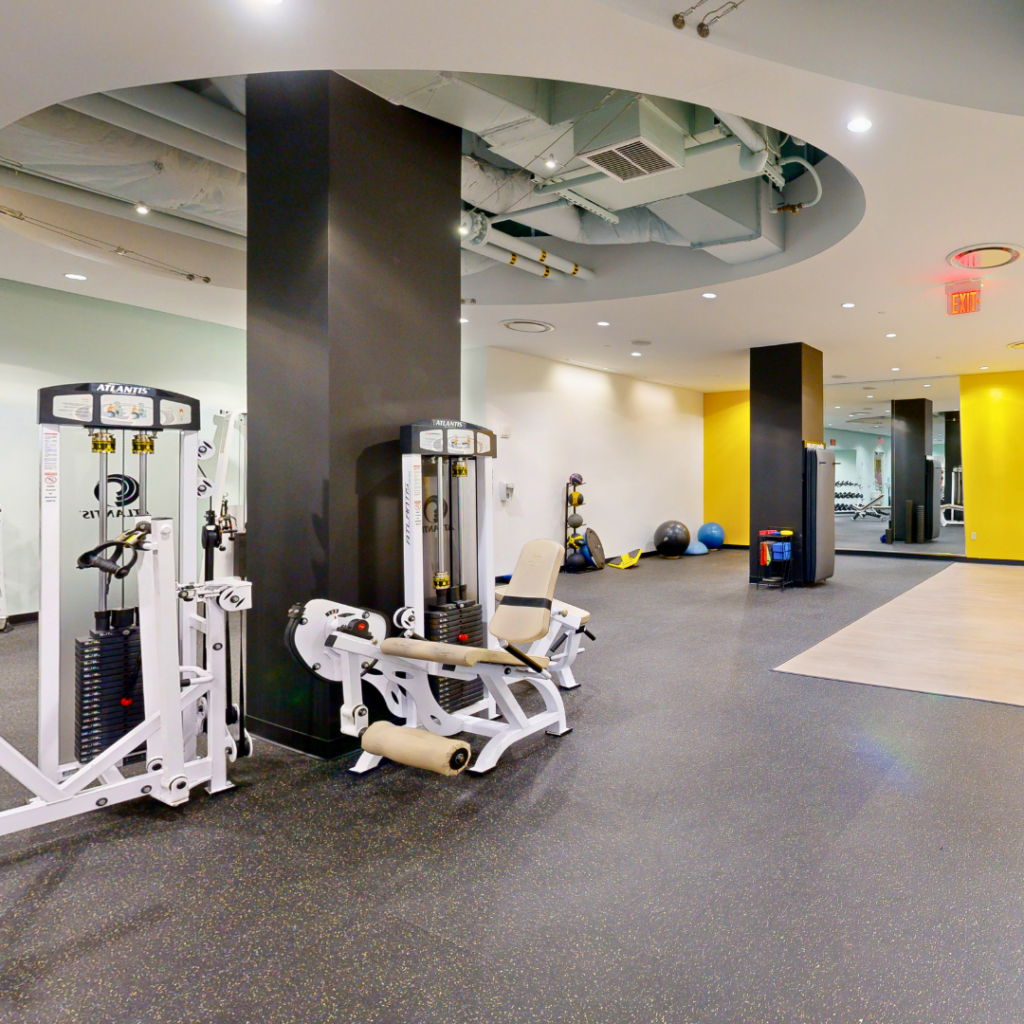 Market West Fitness gym floor with workout machines in Wilmington, Delaware